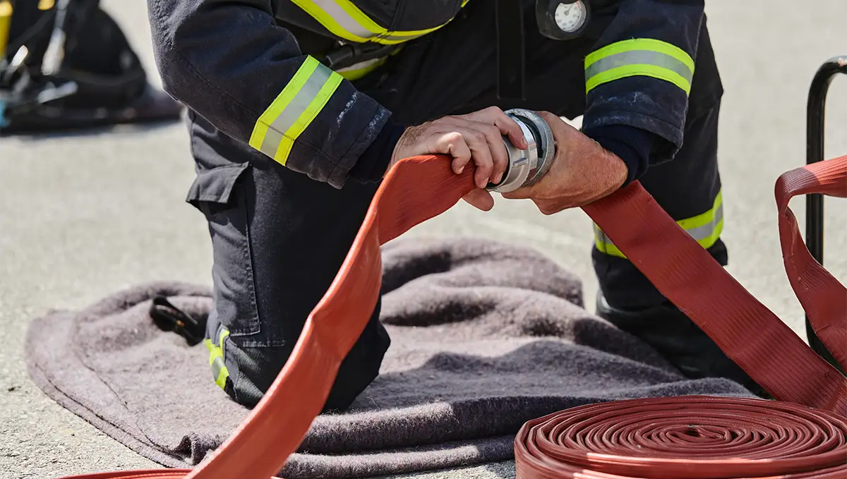 Firefighter with hose