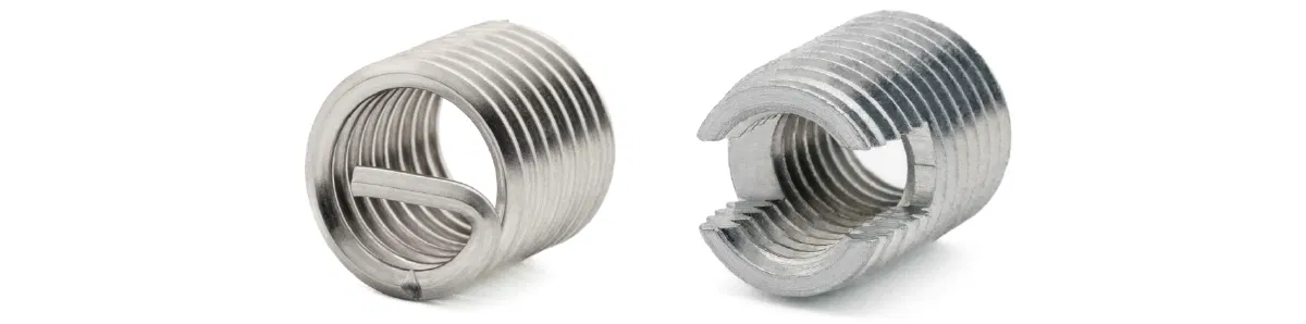 Zwei Gewindeeinsätze aus Metall Zwei Gewindeeinsätze aus Metall