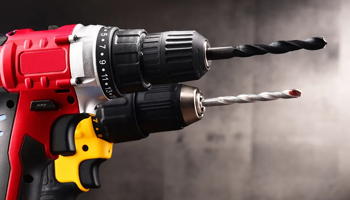 Two cordless drills with different drill bits