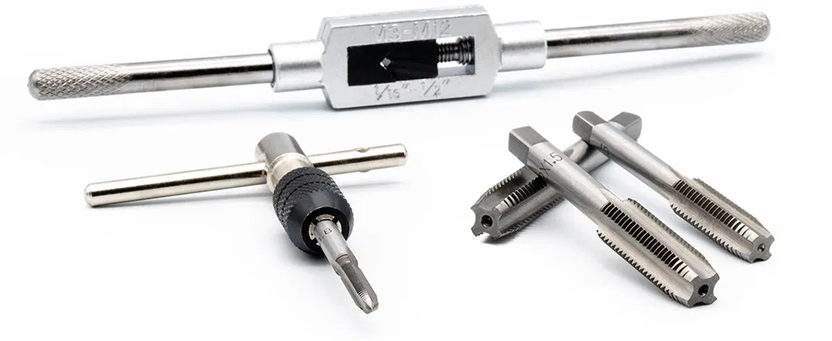 Various hand taps with operating tools Various hand taps with operating tools