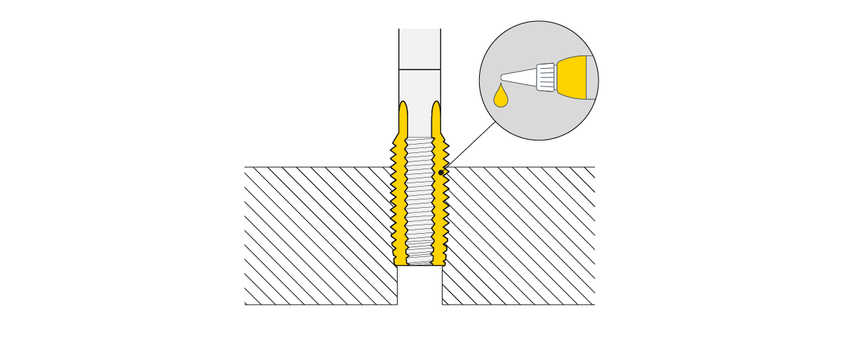Schematic drawing of a thread tap partially inserted into a borehole. A specific point is marked where friction is highest, indicating where the lubricant should be applied. Schematic drawing of a thread tap partially inserted into a borehole. A specific point is marked where friction is highest, indicating where the lubricant should be applied.